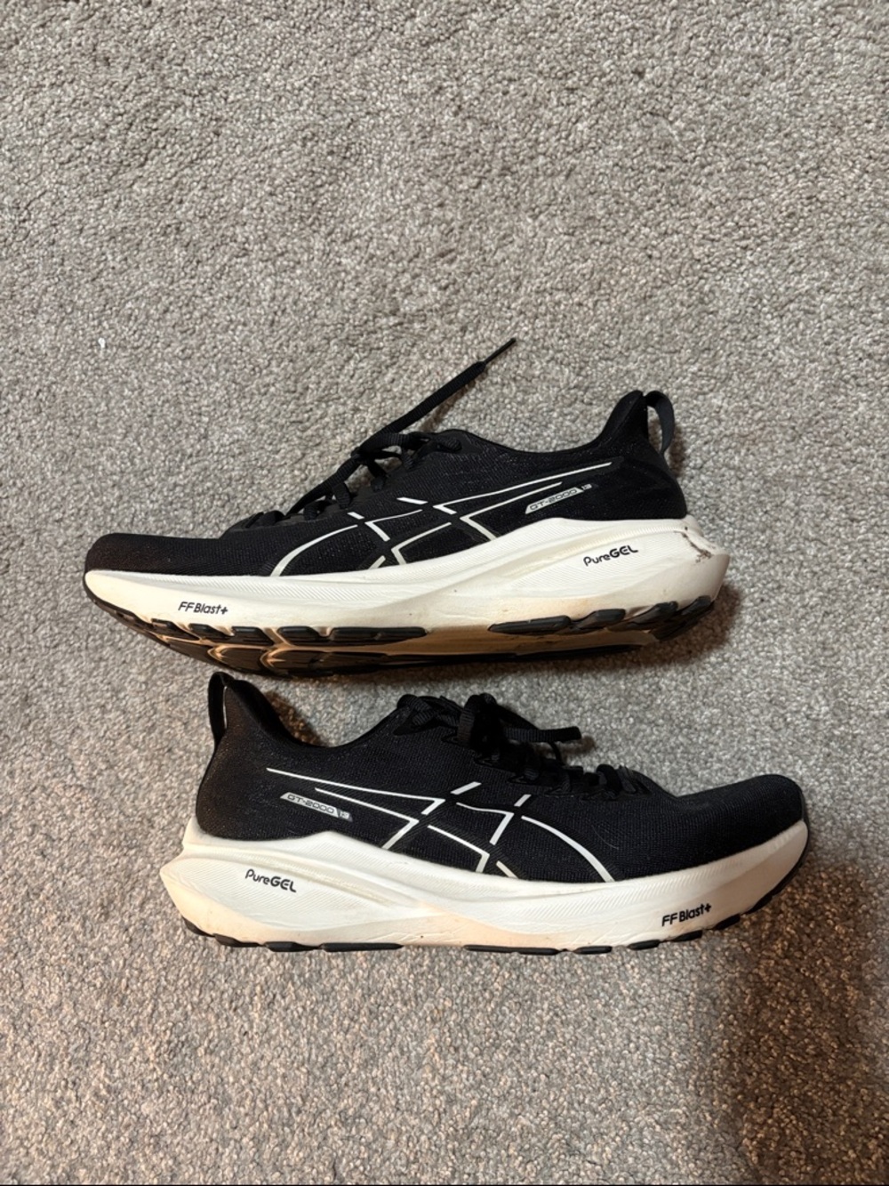 Asics Black and White Running Shoe Soles